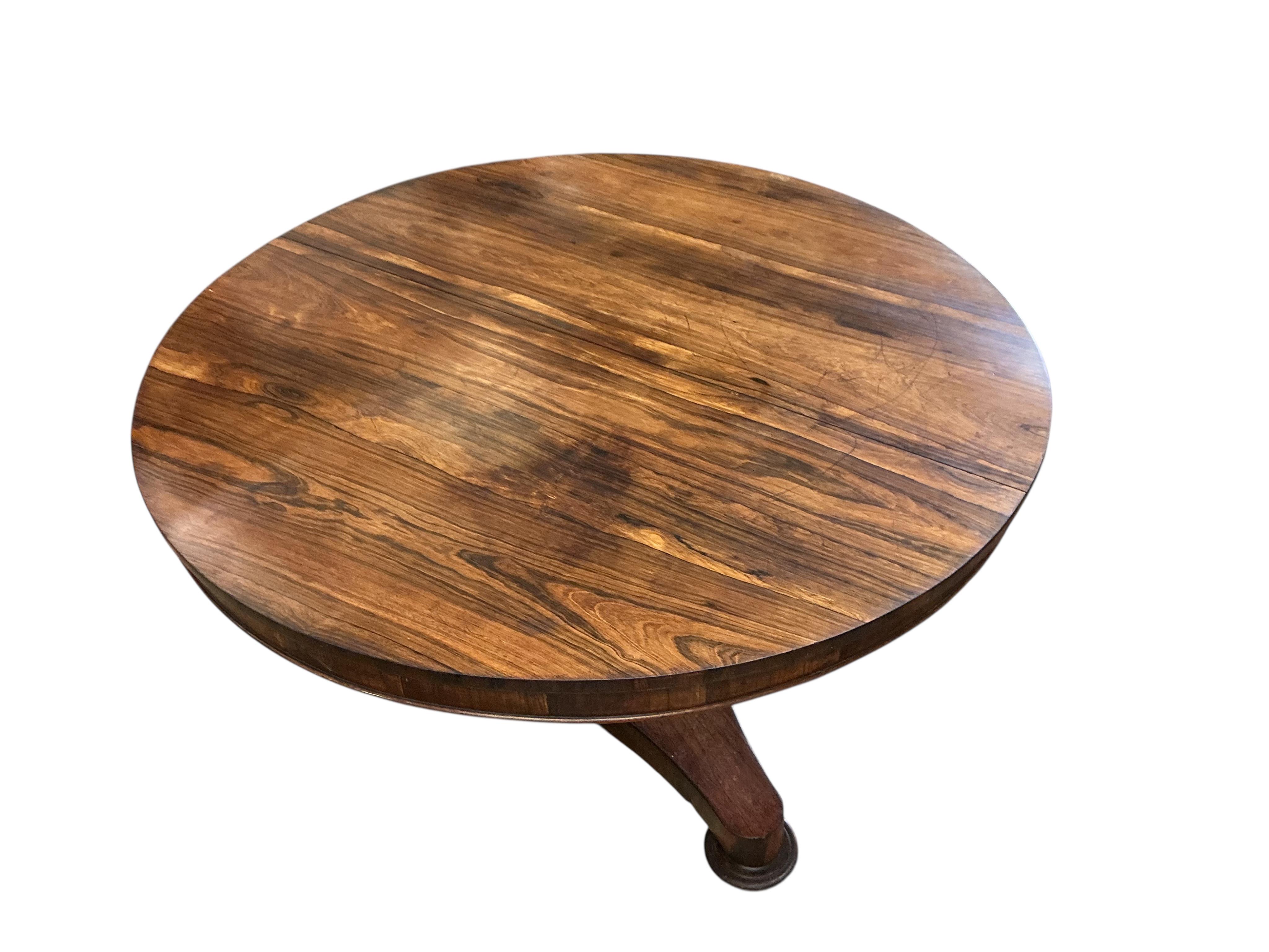 An early Victorian circular rosewood tilt top breakfast table, diameter 130cm, height 74cm
